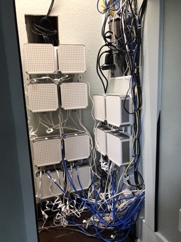 Structured wiring closet with Sonos amplifiers for whole-home audio